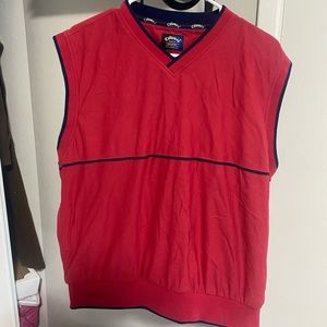 red vest with blue lining wind breaker